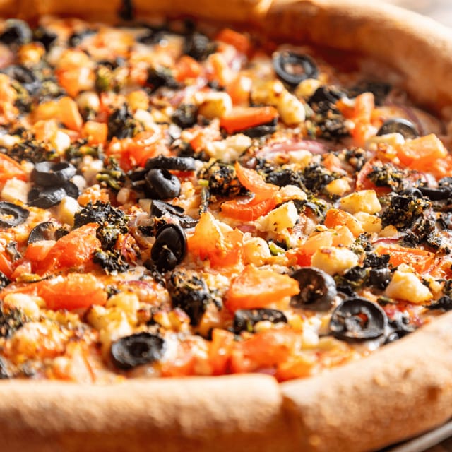 Greek pizza slice.