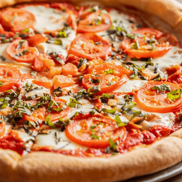 Margherita pizza slice.