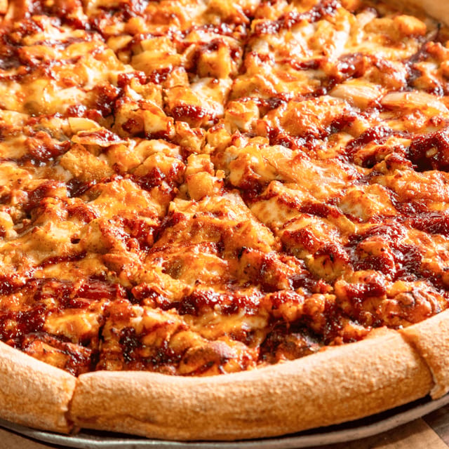 BBQ chicken pizza slice.